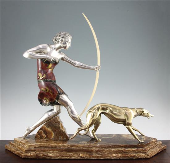 A French Art Deco silvered and painted model of a huntress, 23in.